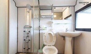 Shower, free toiletries, hair dryer, slippers