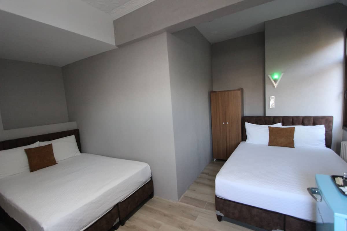 Economy Twin Room, 2 Single Beds | Minibar, blackout curtains, soundproofing