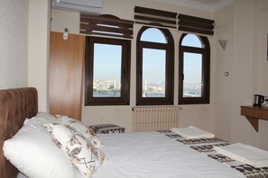 Standard Quadruple Room, Sea View | Minibar, blackout curtains, soundproofing, iron/ironing board - Biter Hotel (Istanbul)