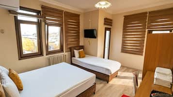 Quarto quádruplo standard, vista para o mar | Frigobar, cortinas blackout, quartos à prova de som