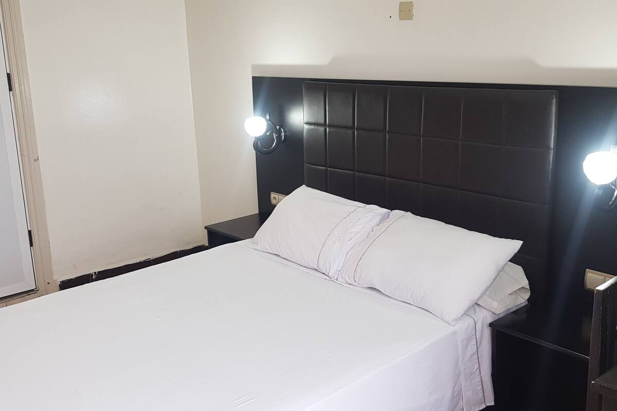 Desk, blackout curtains, rollaway beds, bed sheets