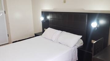 Standard Double Room | Desk, blackout drapes, rollaway beds, bed sheets