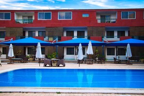 Seasonal outdoor pool, pool loungers
