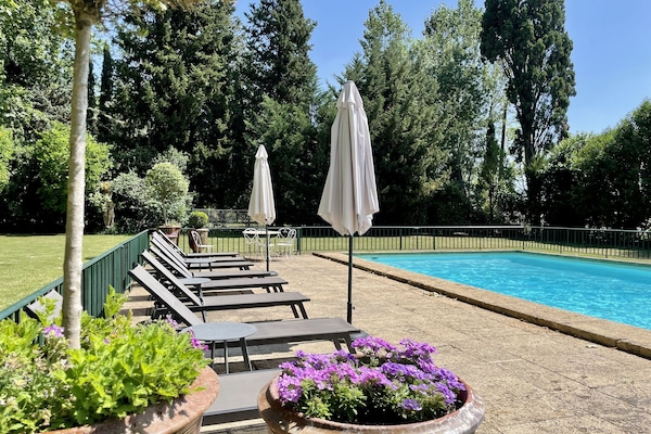 Seasonal outdoor pool, open 9:00 AM to 9:00 PM, pool umbrellas