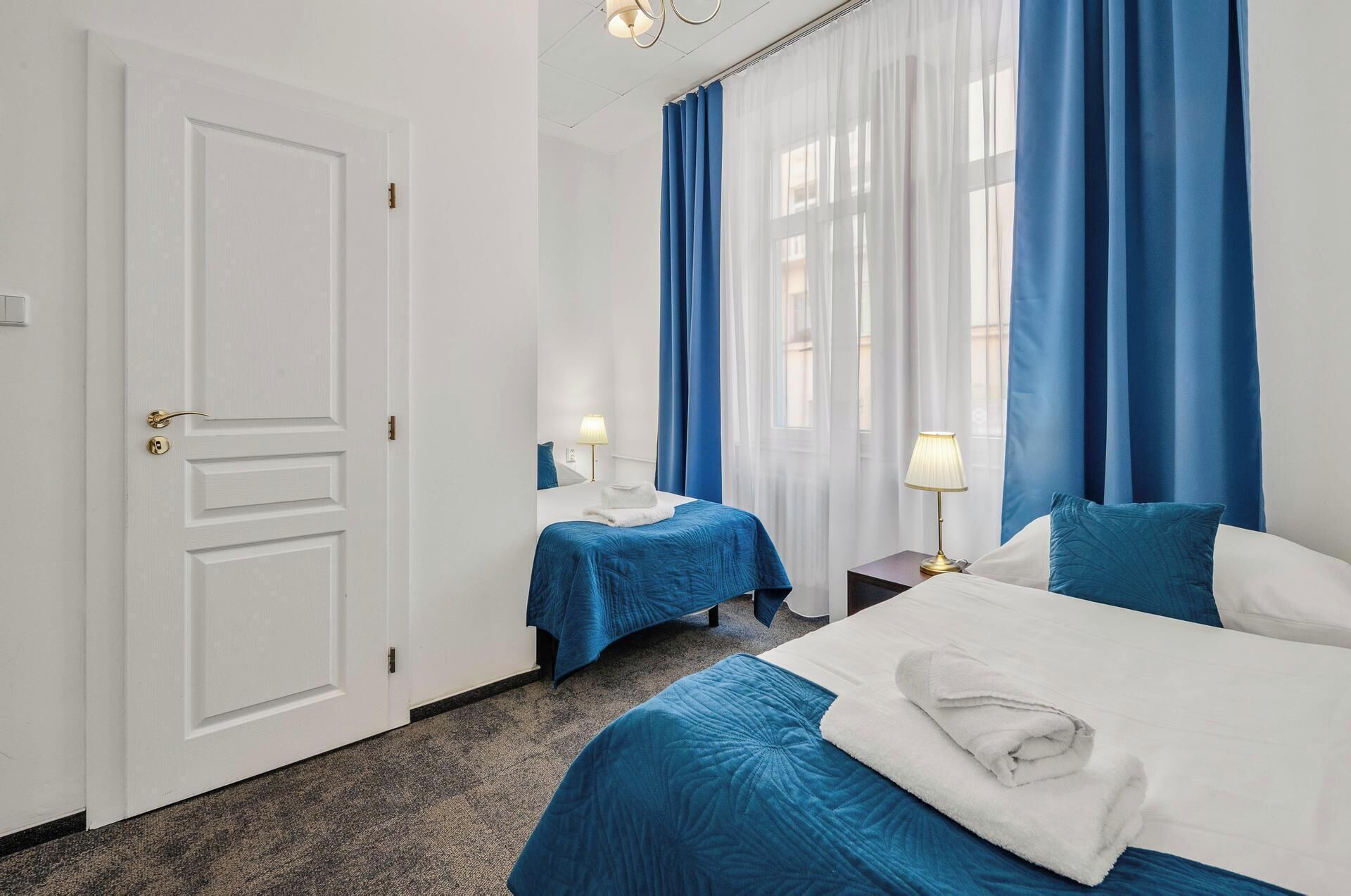 family room, 2 bedrooms | 1 bedroom, blackout curtains, free wifi, bed sheets