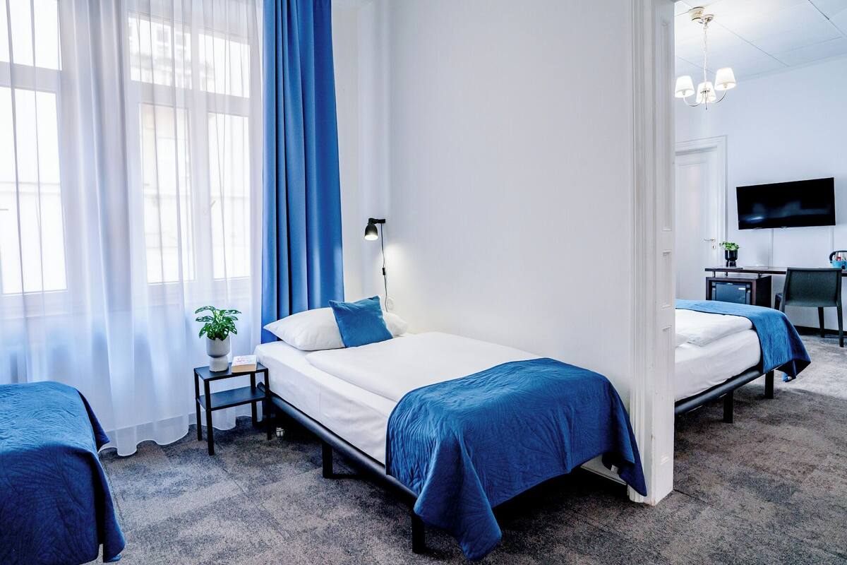 Family Room, 2 Bedrooms | Blackout drapes, WiFi (free), bed sheets