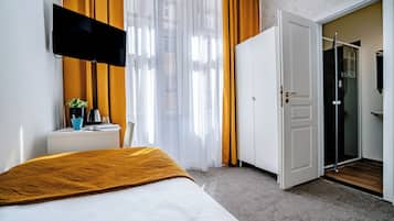 スタンダード シングルルーム | 遮光カーテン、WiFi (無料)、ベッドシーツ