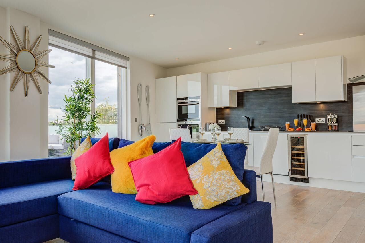 Two-Bedroom Apartment | Living area | Flat-screen TV