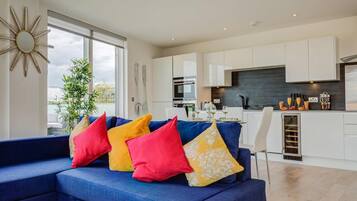 Two-Bedroom Apartment | Living area | Flat-screen TV