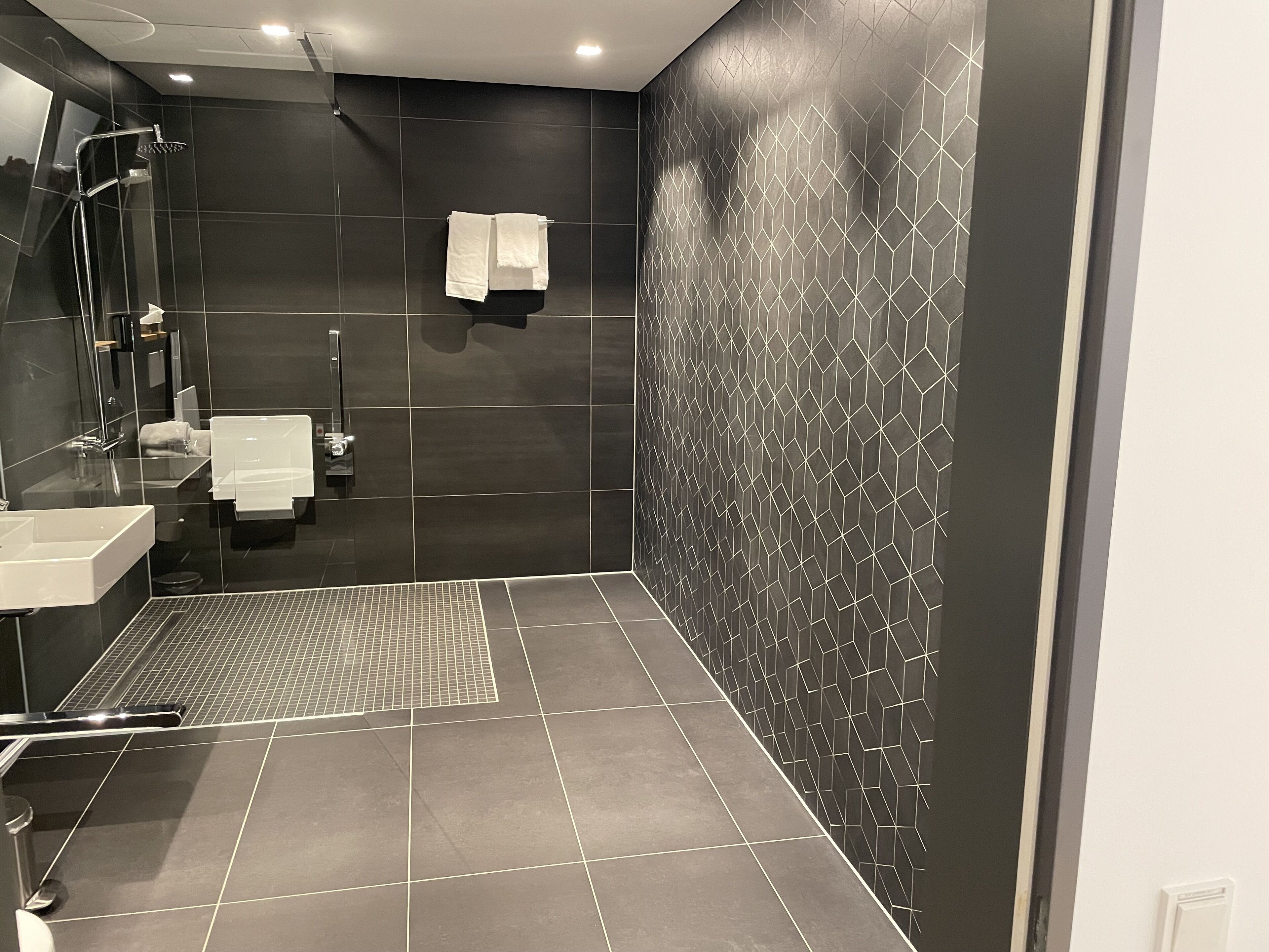 standard twin room | bathroom | hair dryer, towels, toilet paper