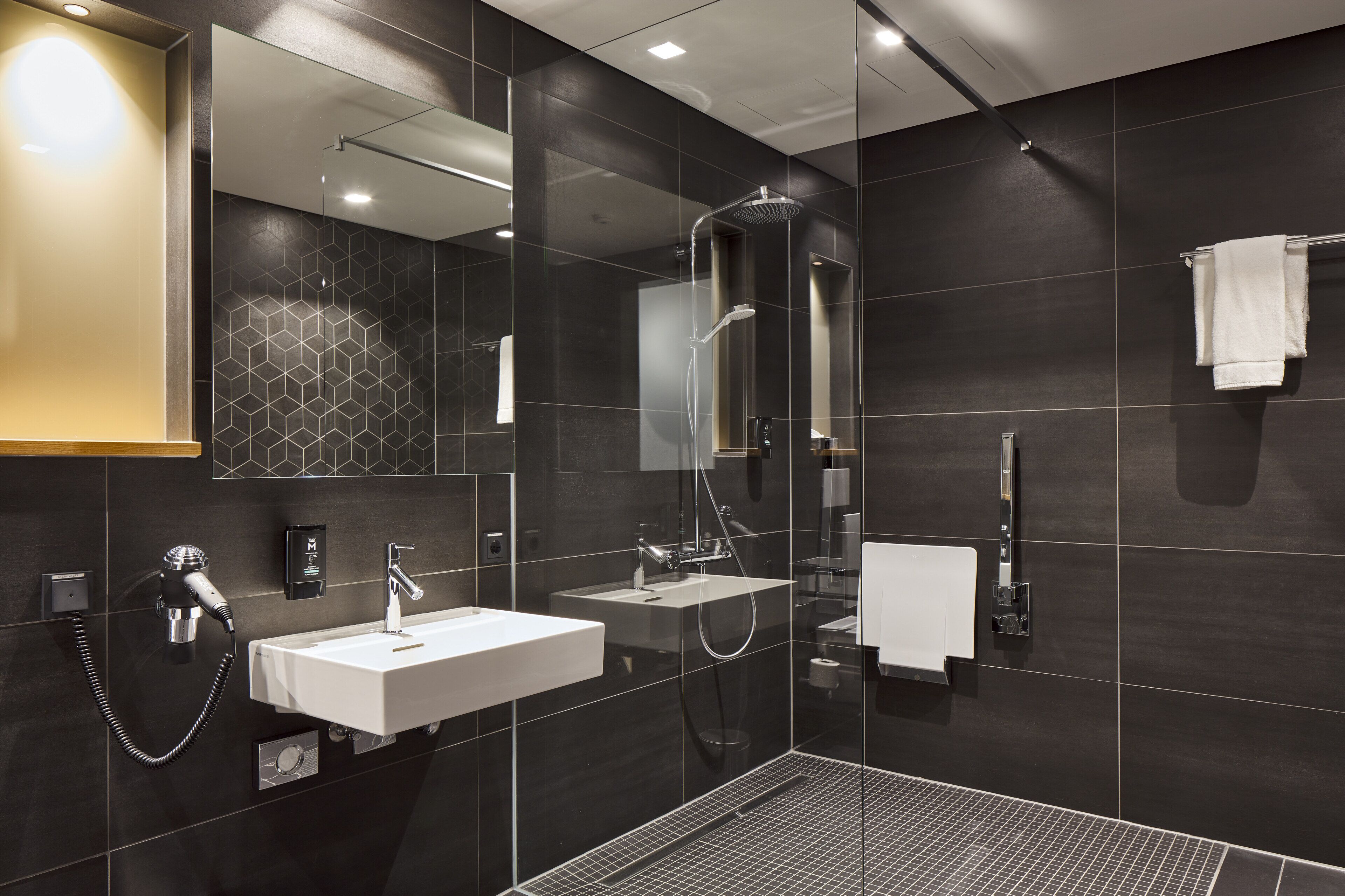 standard twin room | bathroom | hair dryer, towels, toilet paper