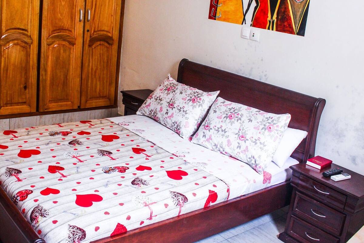 Desk, blackout curtains, bed sheets