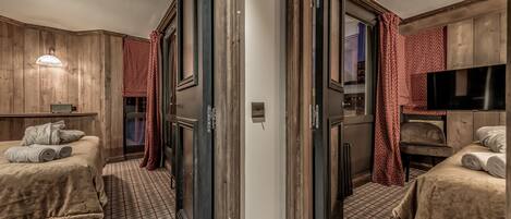 Family Room, 2 Bedrooms | 5 bedrooms, minibar, in-room safe, individually decorated