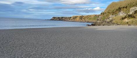 On the beach, sun loungers, beach towels