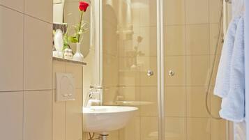 Shower, free toiletries, hair dryer, towels