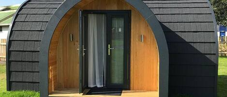 Camping Pods | Individually decorated, individually furnished, blackout curtains