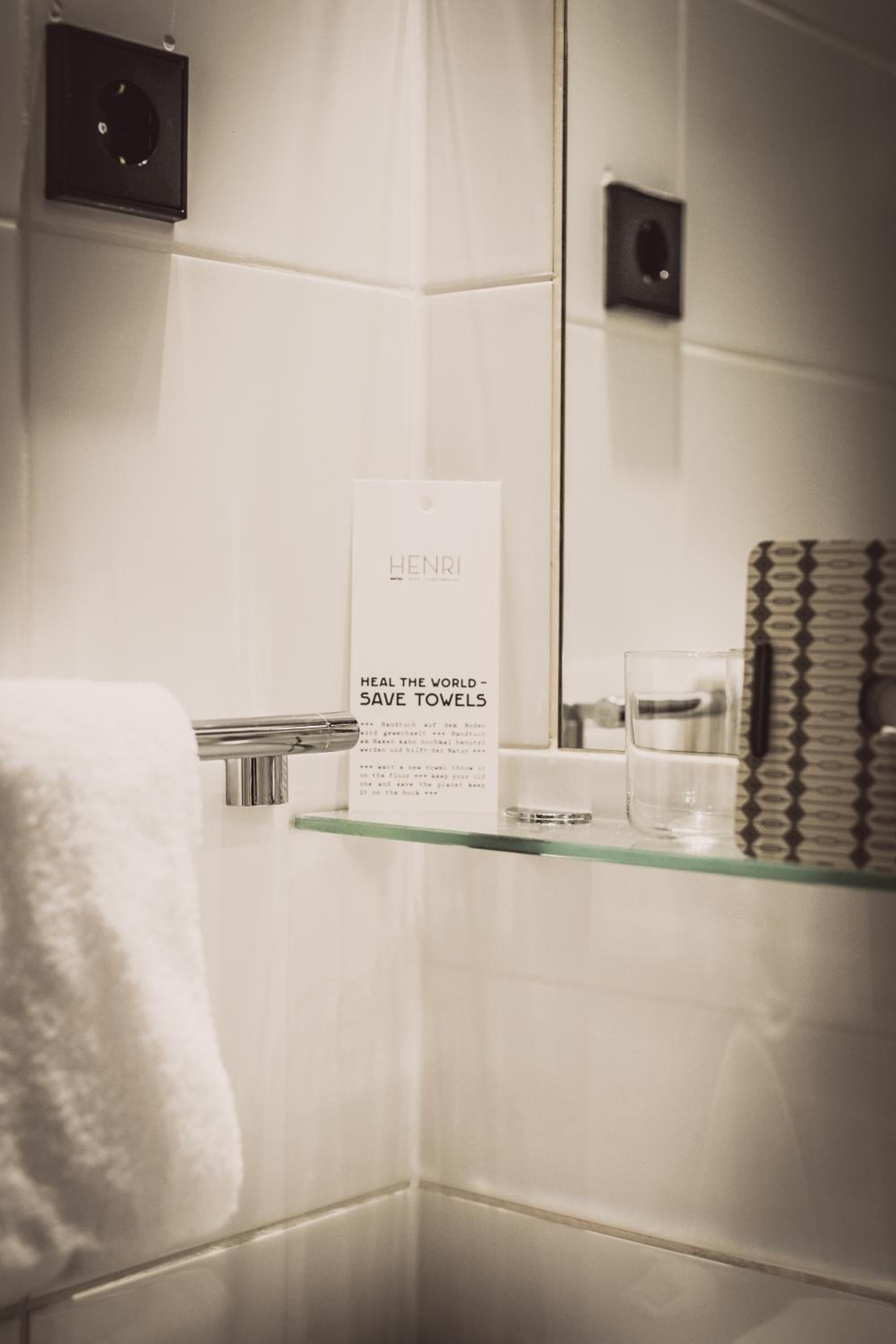 bathtub, deep-soaking bathtub, hair dryer, towels