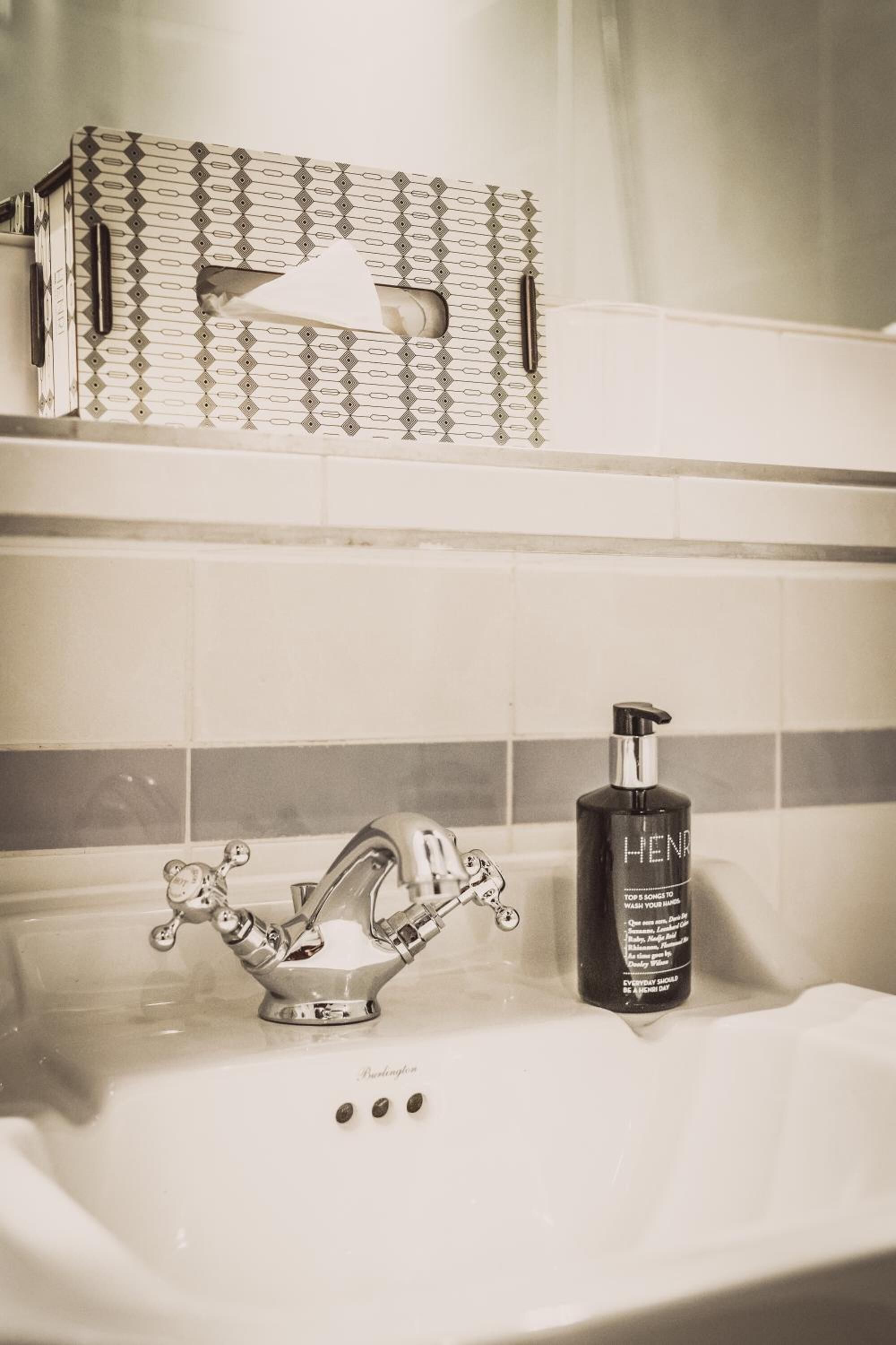 bathtub, deep-soaking bathtub, hair dryer, towels