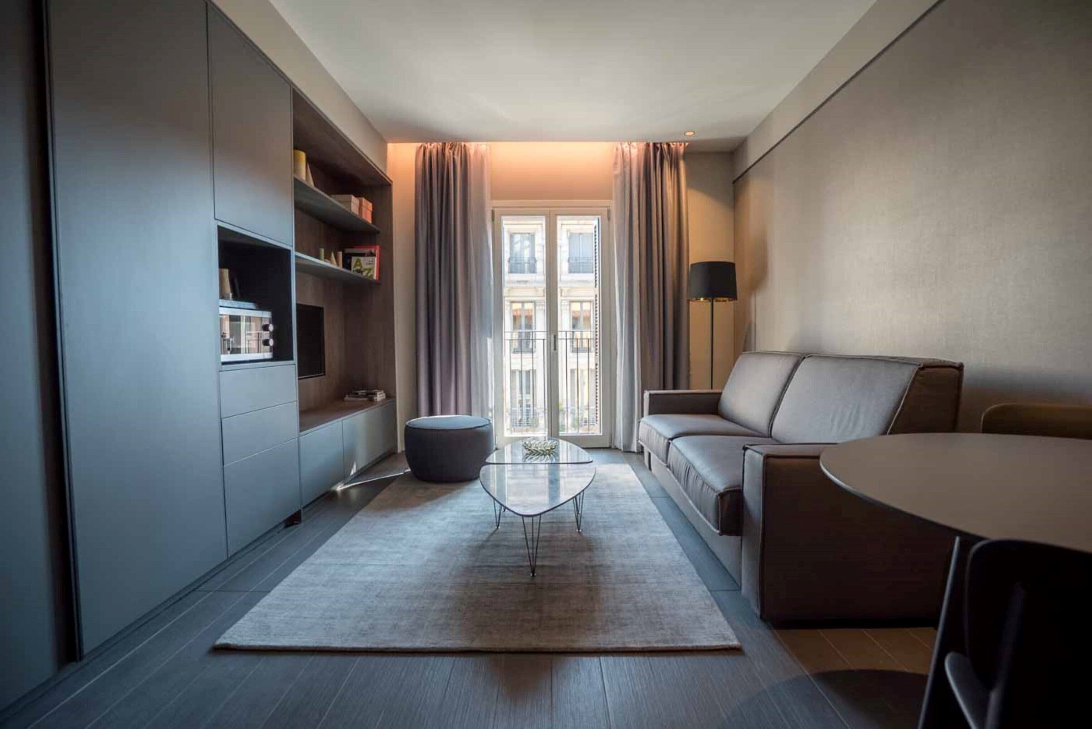 Departamento Deluxe, 2 habitaciones, 2 baños | Sala de estar | Televisión de pantalla plana 