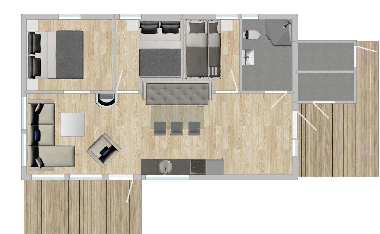 Distribución de una habitación de hotel con cama, sofá, mesa de comedor, cocina y baño.