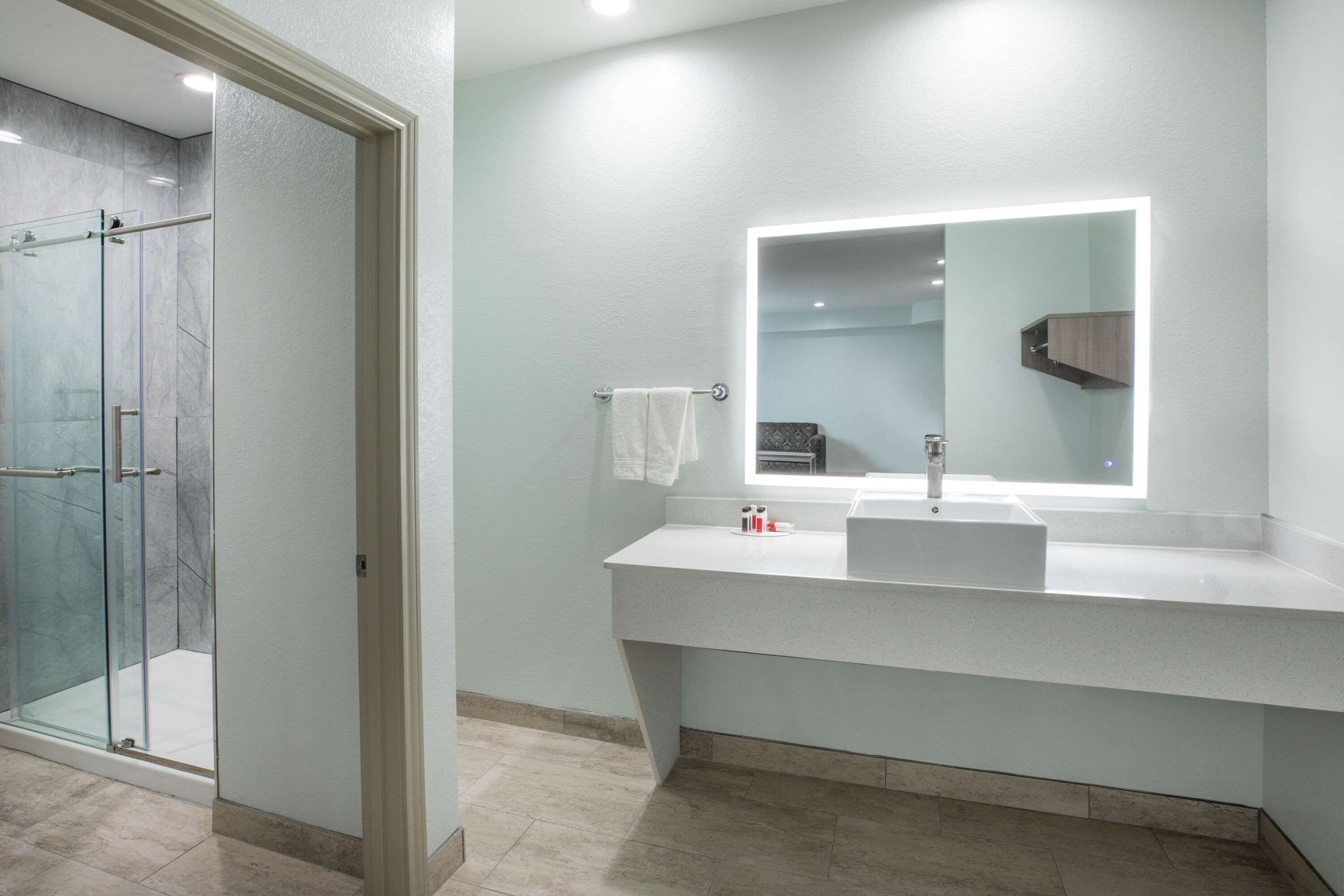 Combined shower/bathtub, hair dryer, towels, soap