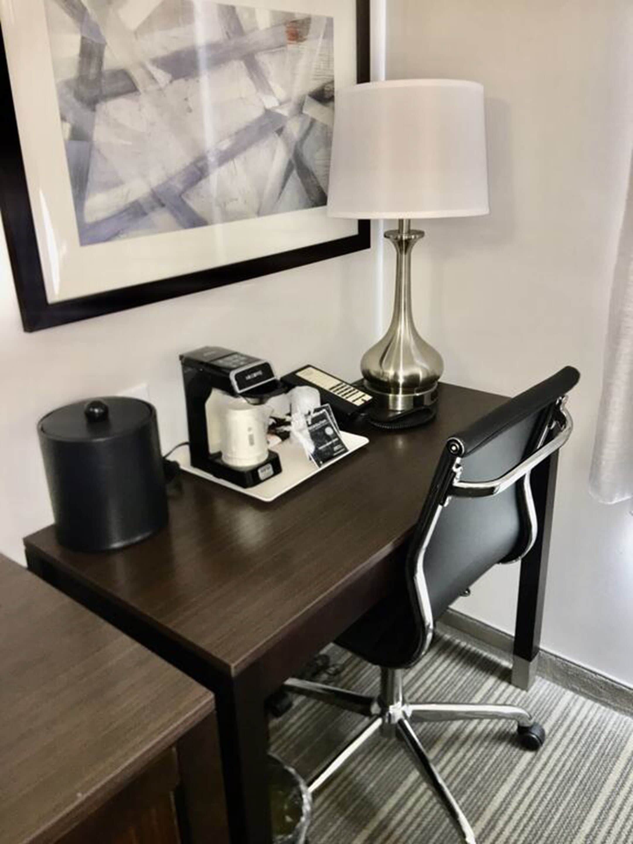 hypo-allergenic bedding, desk, laptop workspace, blackout curtains