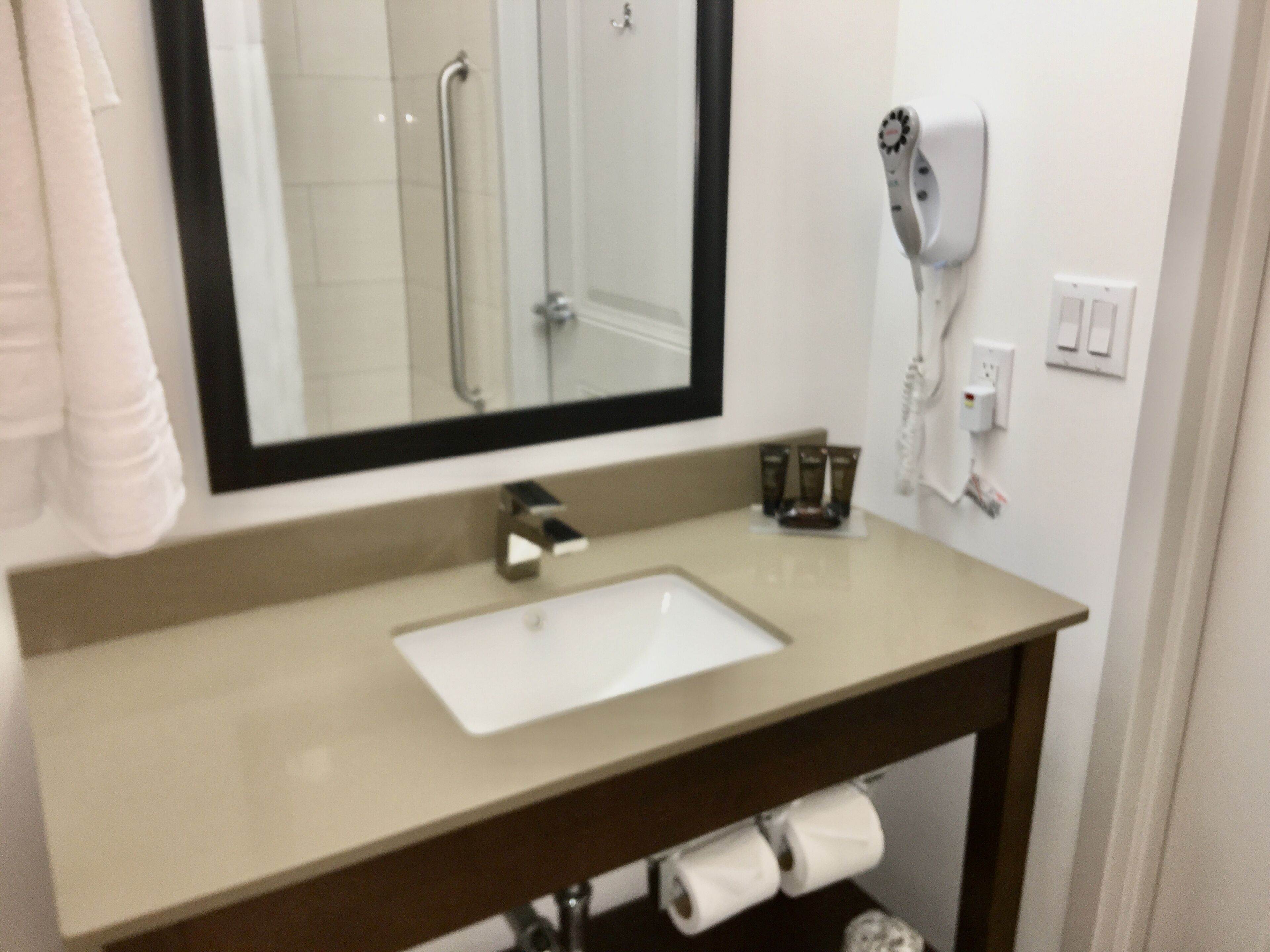 combined shower/bathtub, hair dryer, towels, soap