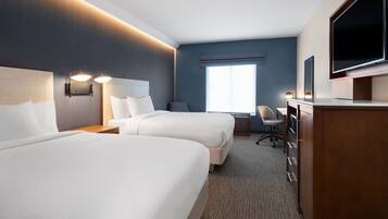 Värdeförvaringsskåp på rummet, skrivbord och arbetsyta för laptop