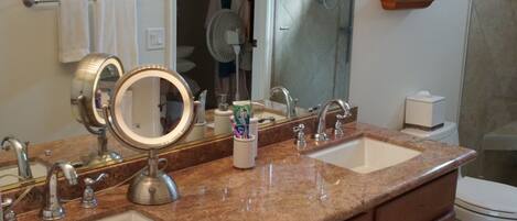 Combined shower/tub, hair dryer, towels, soap