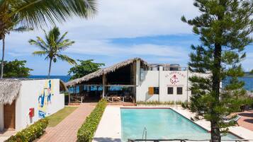 Outdoor pool, open 10:00 AM to 6:00 PM, pool umbrellas, pool loungers