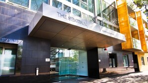 A modern building with a sign reading "THE SENTINEL" and "88 AVANAGH STREET". - In the heart of Southbank! (Southbank)
