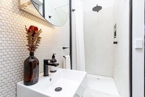 Hair dryer, towels, soap, toilet paper