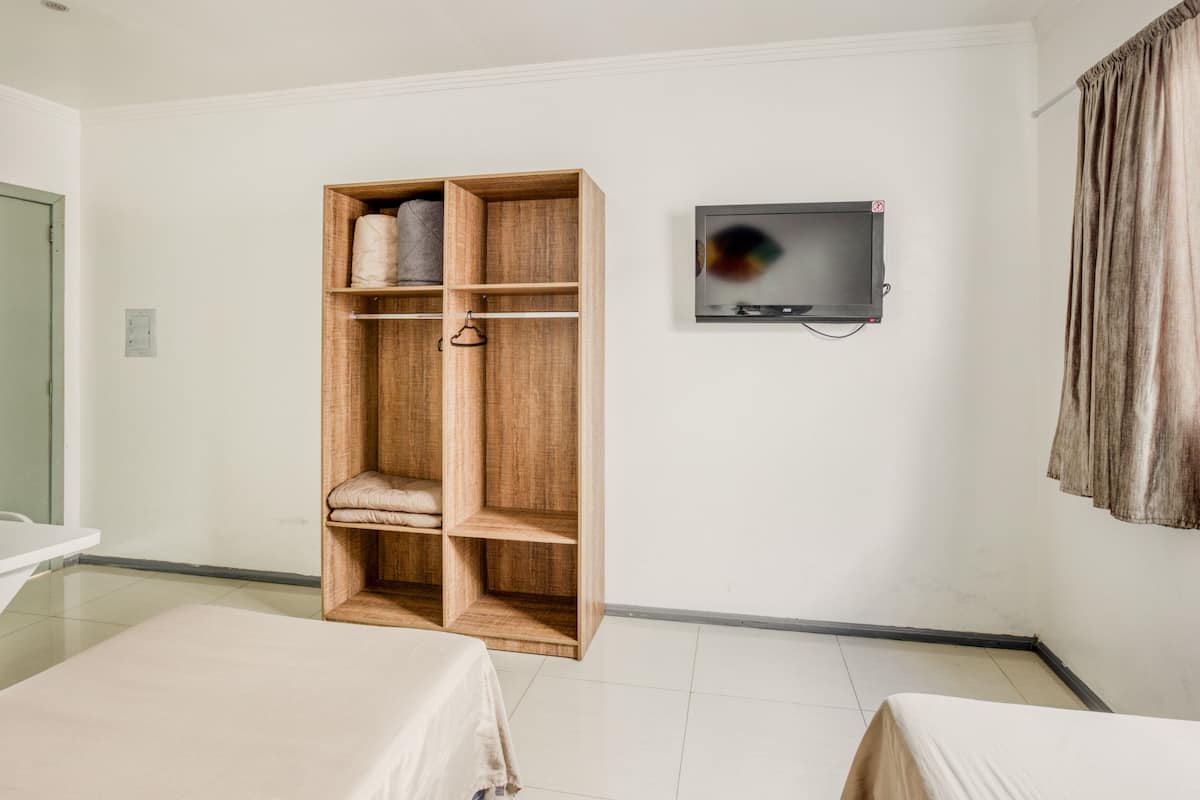 Twin kamer | Een minibar, een bureau, gratis wifi, beddengoed