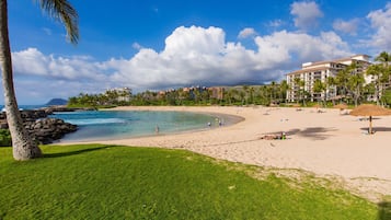 On the beach, sun loungers, beach towels