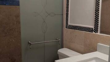 Shower, hair dryer, towels, soap