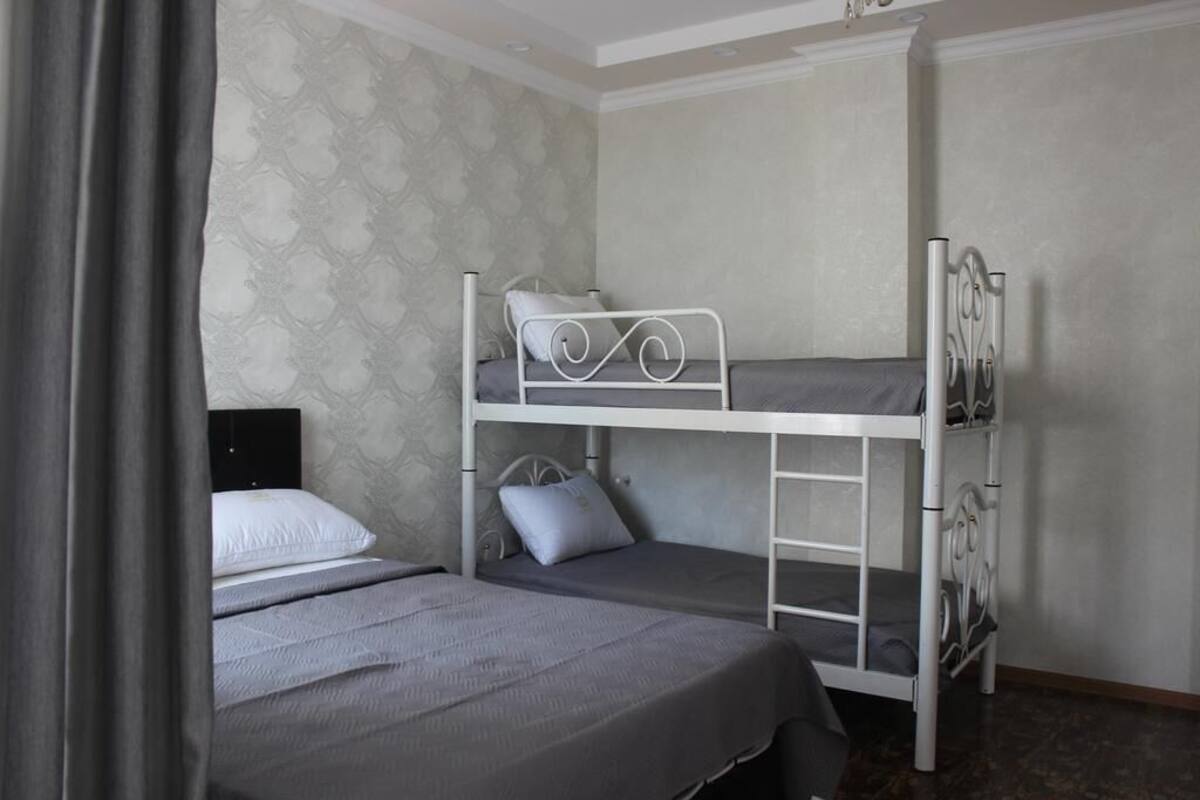 Family Room | 1 bedroom, desk, iron/ironing board, free WiFi
