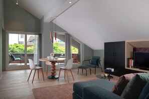 Suite | Living area | 43-inch flat-screen TV with digital channels, TV, Netflix - Sorell Boutique-Hotel St. Peter Zürich (Zürich)