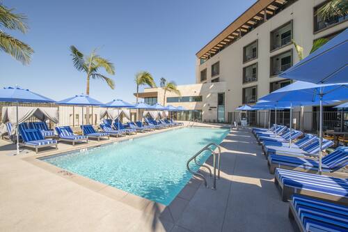 Outdoor pool, free pool cabanas, pool umbrellas