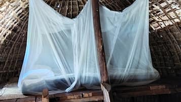Economy Quadruple Room, Shared Bathroom (Giriama) | Iron/ironing board, bed sheets