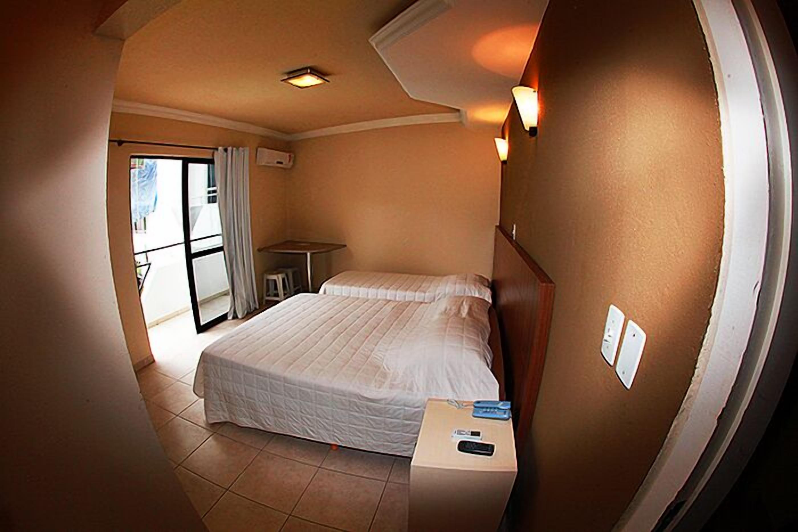 triple room, multiple beds | minibar, desk, blackout curtains, free wifi