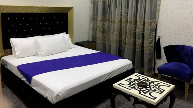 Basic Single Room | Soundproofing, free WiFi, bed sheets - Hilton Grand Hotel (Lahore)