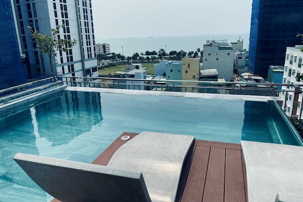 12 outdoor pools, pool loungers