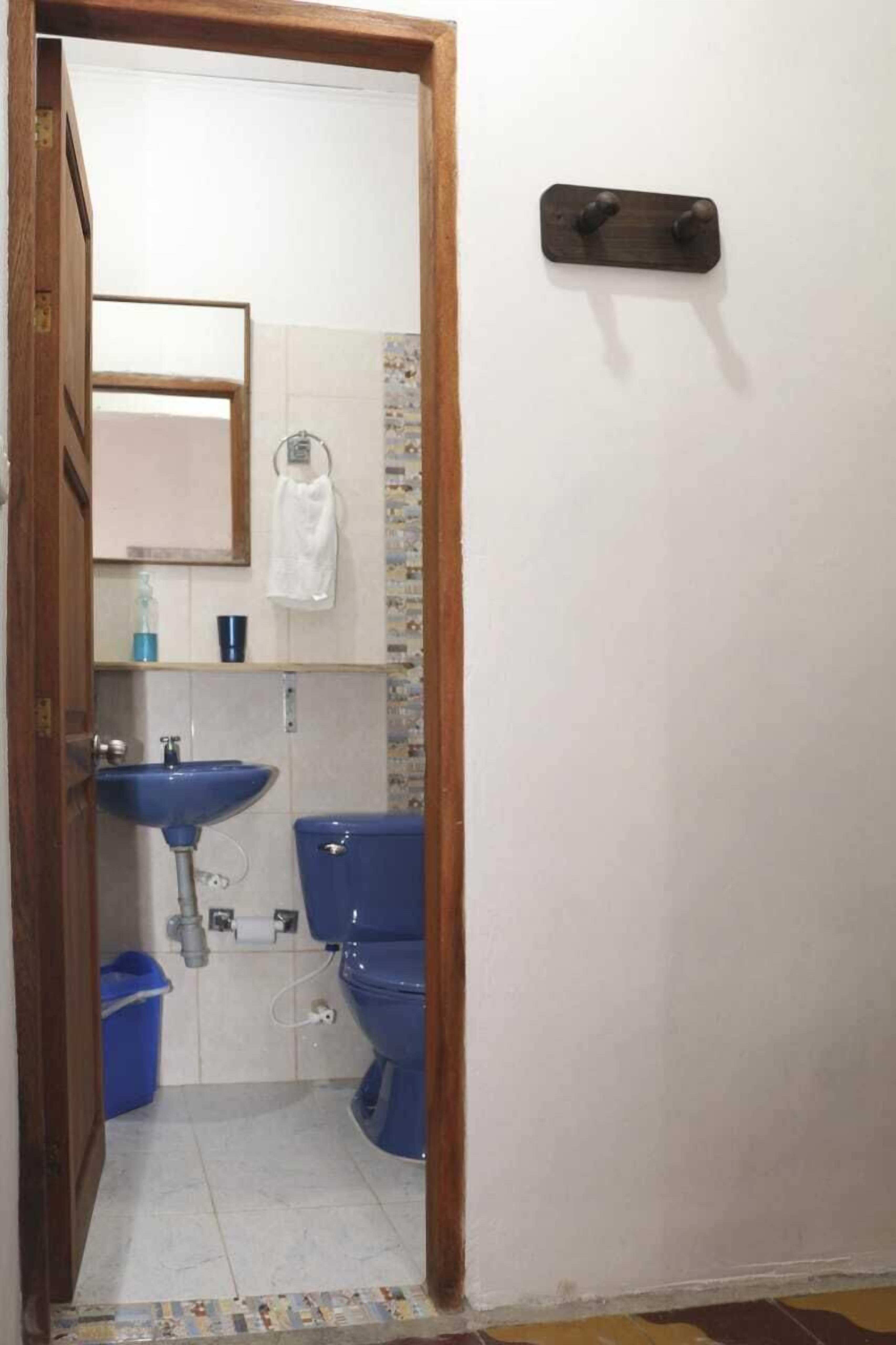 Shower, rainfall showerhead, hair dryer, towels