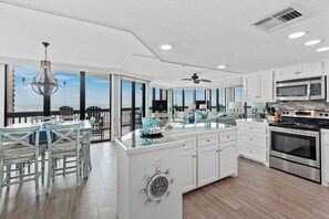 Fridge, microwave, oven, stovetop - Sandpiper Condominiums 403, Panoramic Gulf Views w/ direct access to Mustang Island/Port A beaches. (Port Aransas)