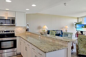 Fridge, microwave, oven, stovetop - Sandpiper Condominiums 307L, Panoramic Gulf Views w/ direct access to Mustang Island/Port A beaches. (Port Aransas)