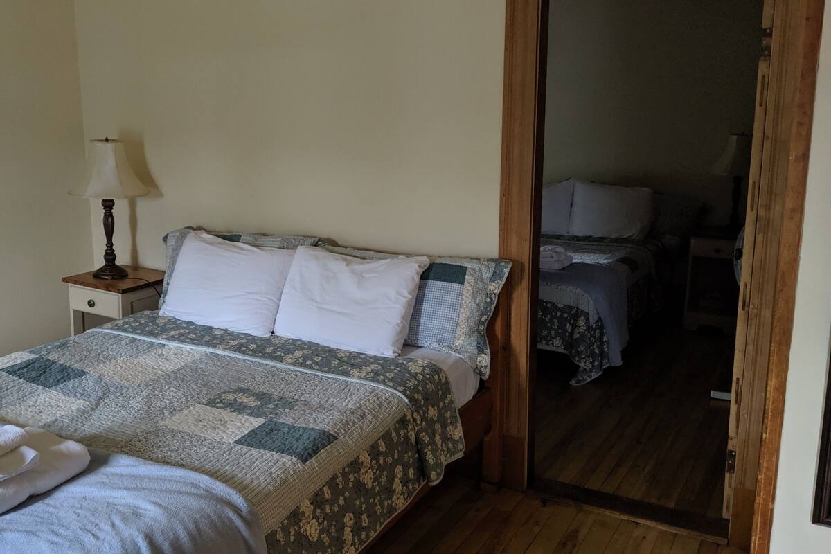 Desk, blackout curtains, iron/ironing board (on request)