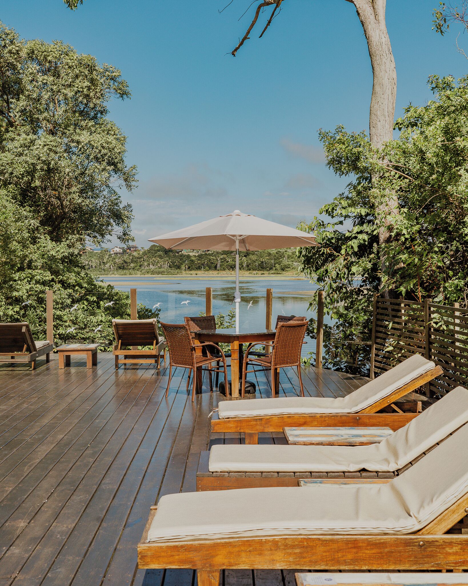 Seasonal outdoor pool, a waterfall pool, pool umbrellas, pool loungers