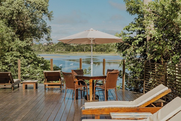 Seasonal outdoor pool, a waterfall pool, pool umbrellas, sun loungers