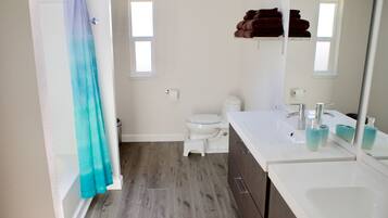 Hair dryer, towels, soap, shampoo