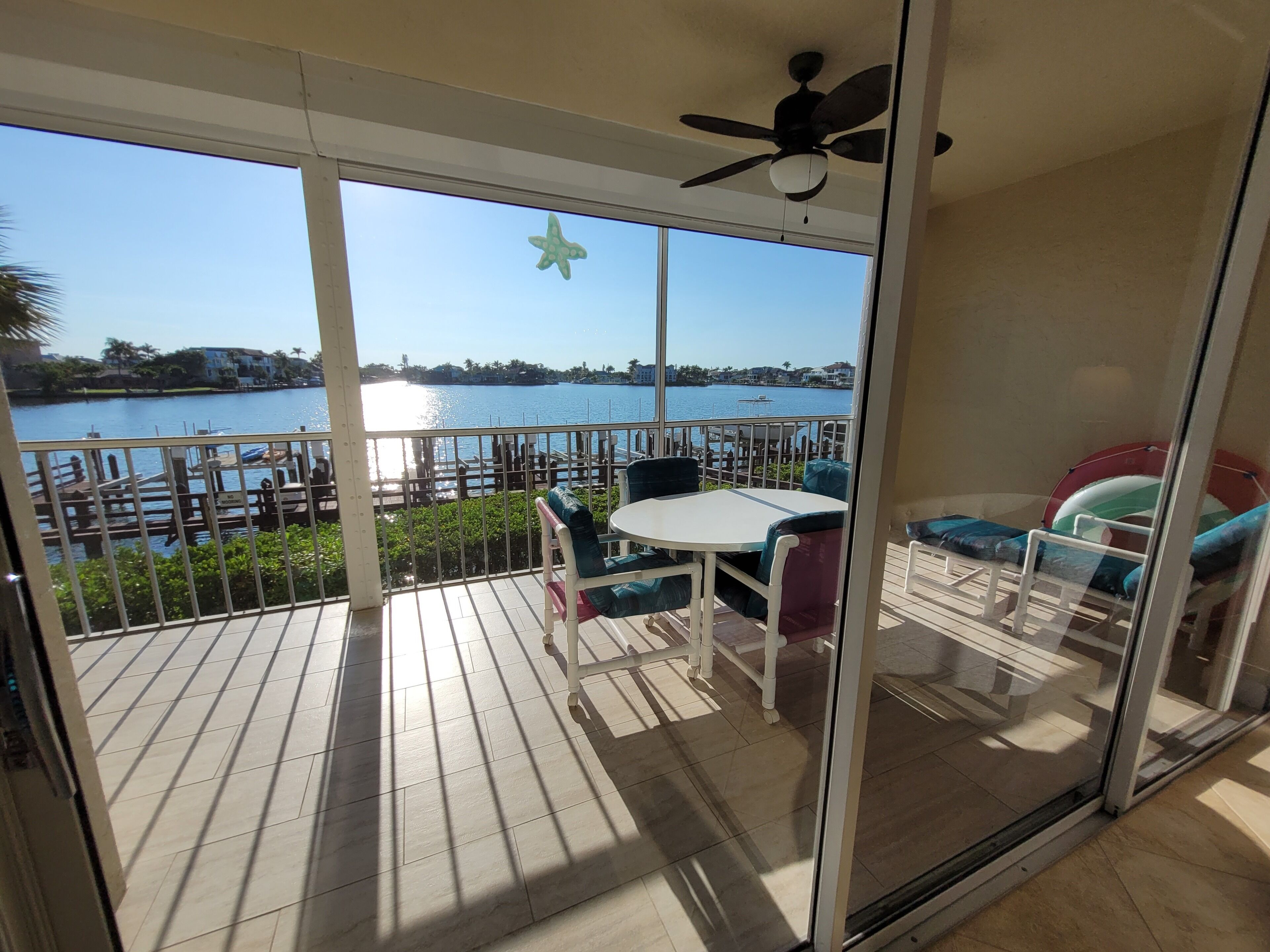 1st Floor Condo Direct Bay/Gulf View 3 Bedroom  2 Baths Steps To Beach! Open May
